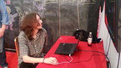 Members of the public playing the game that was developed during the 48 hour game jam at UKIE offices.