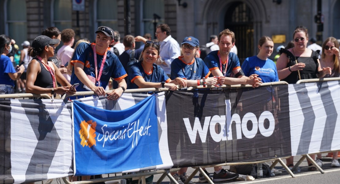 A picture of the Special Effect team cheering the runners on from the sidelines.